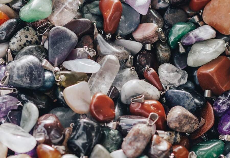 Assorted tumbled gemstones in many colors